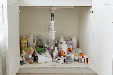Keep Your Bathroom Counter Clear By Using The Right Organizers To Help You Make The Most Of The Prime Storage Space Under Your Bathroom Sink